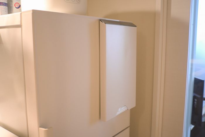 With such a small space, items such as this rubbish bag holder with a magnet that stuck it to the fridge was essential.