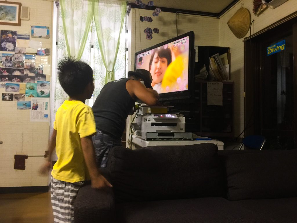 Watching tele with the kid.